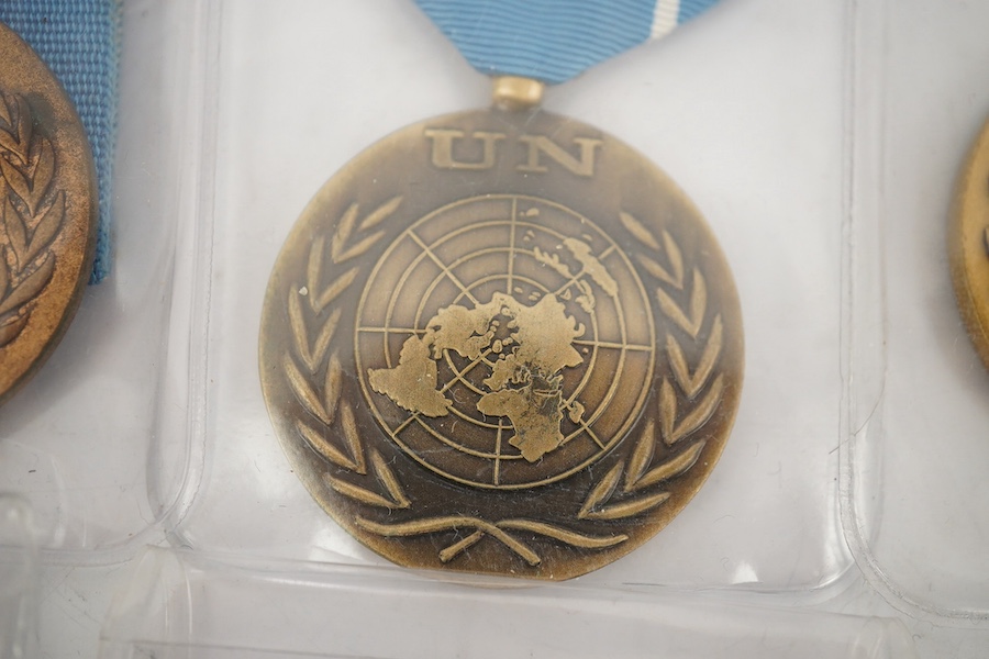 Fourteen United Nations (UN) medals, all with ‘in the service of peace’ to the reverse, including a variety of ribbons for a number of different campaigns (some duplicates). Condition - fair to good.